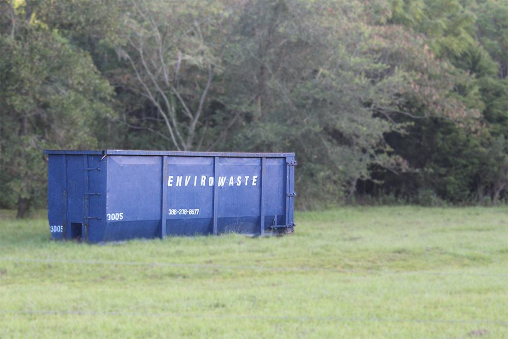 30 yard Envirowaste roll-off dumpster on a multi-week home cleanout and renovation project