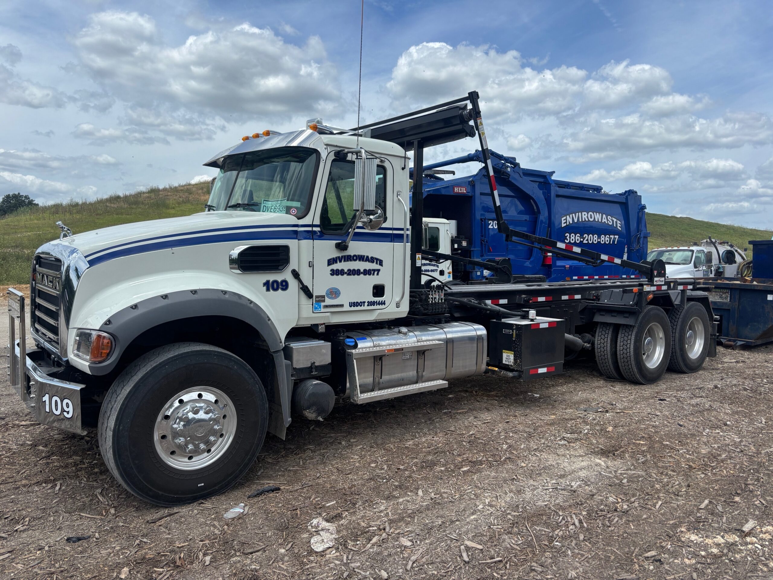 Envirowaste 10-yard roll-off dumpster on a North Florida residential job