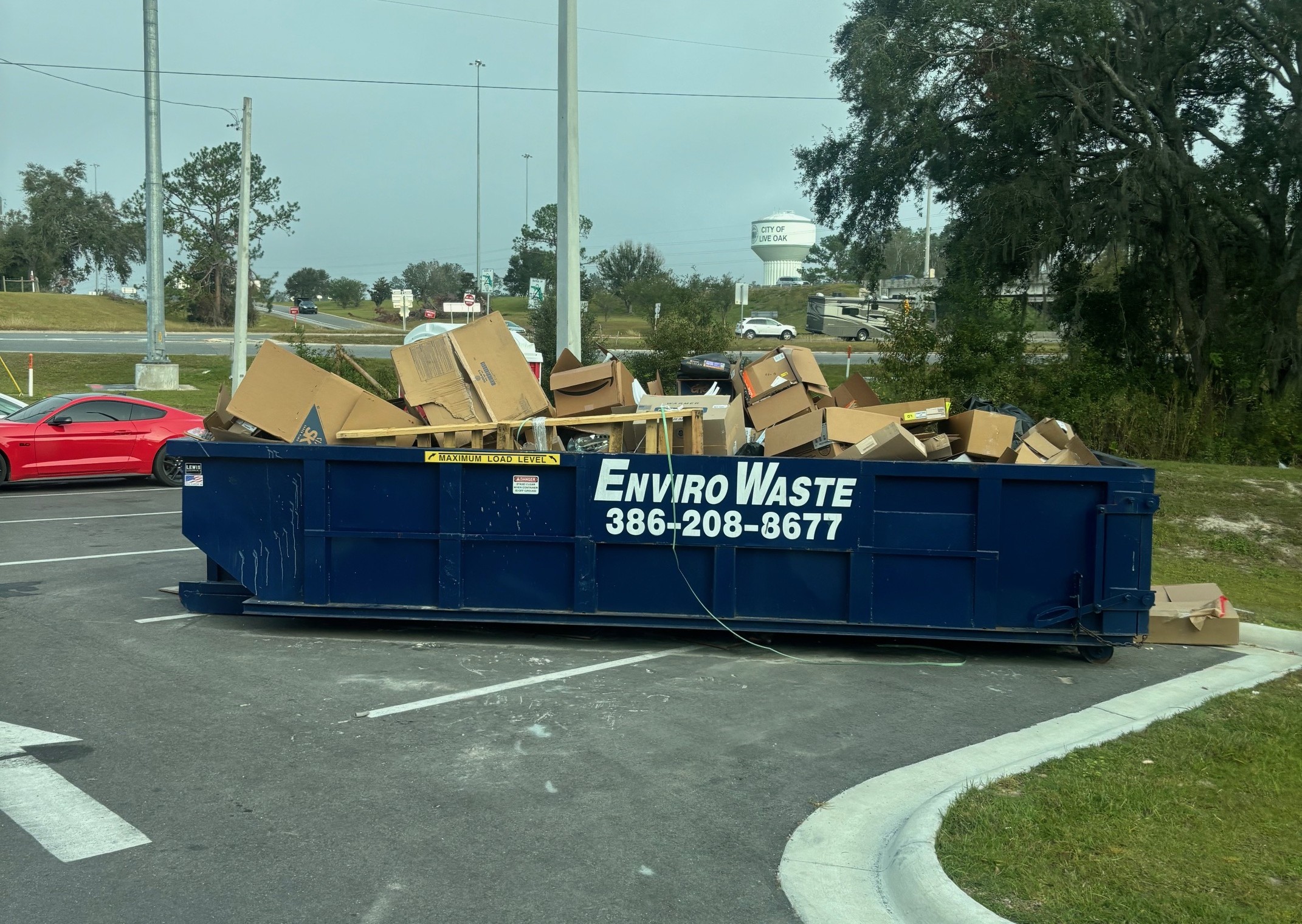 Envirowaste front-load dumpster servicing Gainesville Florida